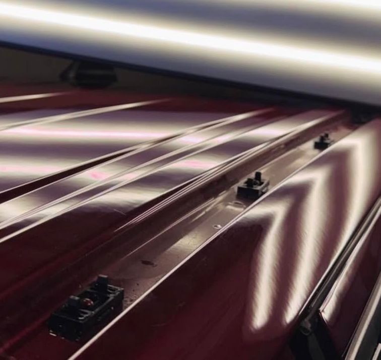 Vehicle after paintless dent repair — factory finish restored — set 1