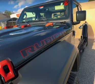 Vehicle after paintless dent repair — factory finish restored — set 4